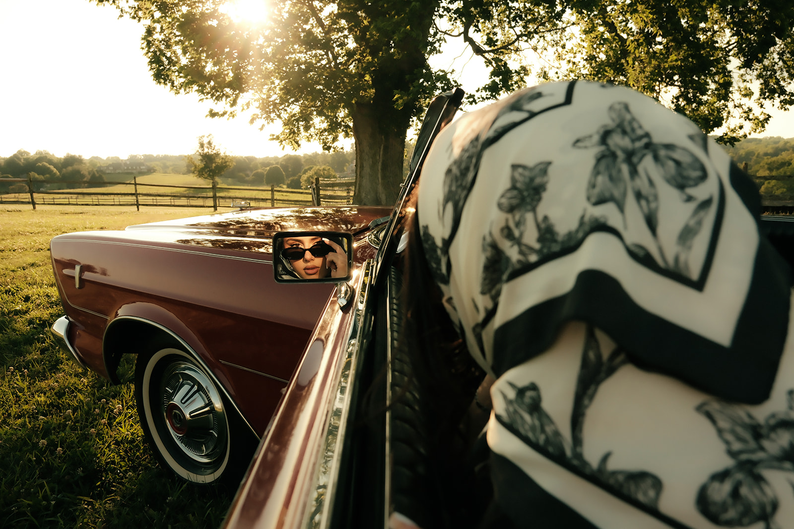 Cinematic sunset portrait — vintage car reflection, Carleo Images